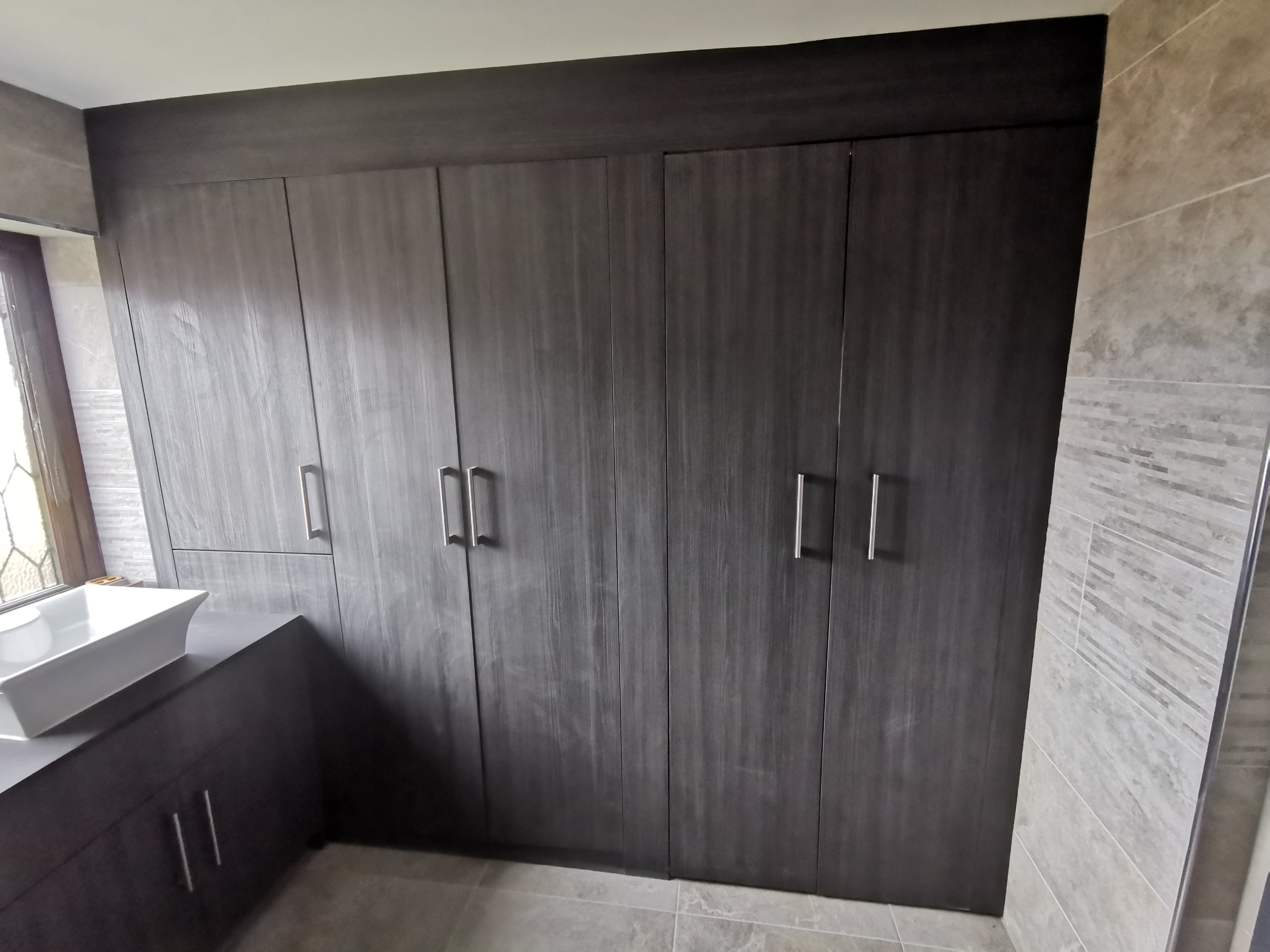 Dark Wood Bathroom Storage with Vanity
